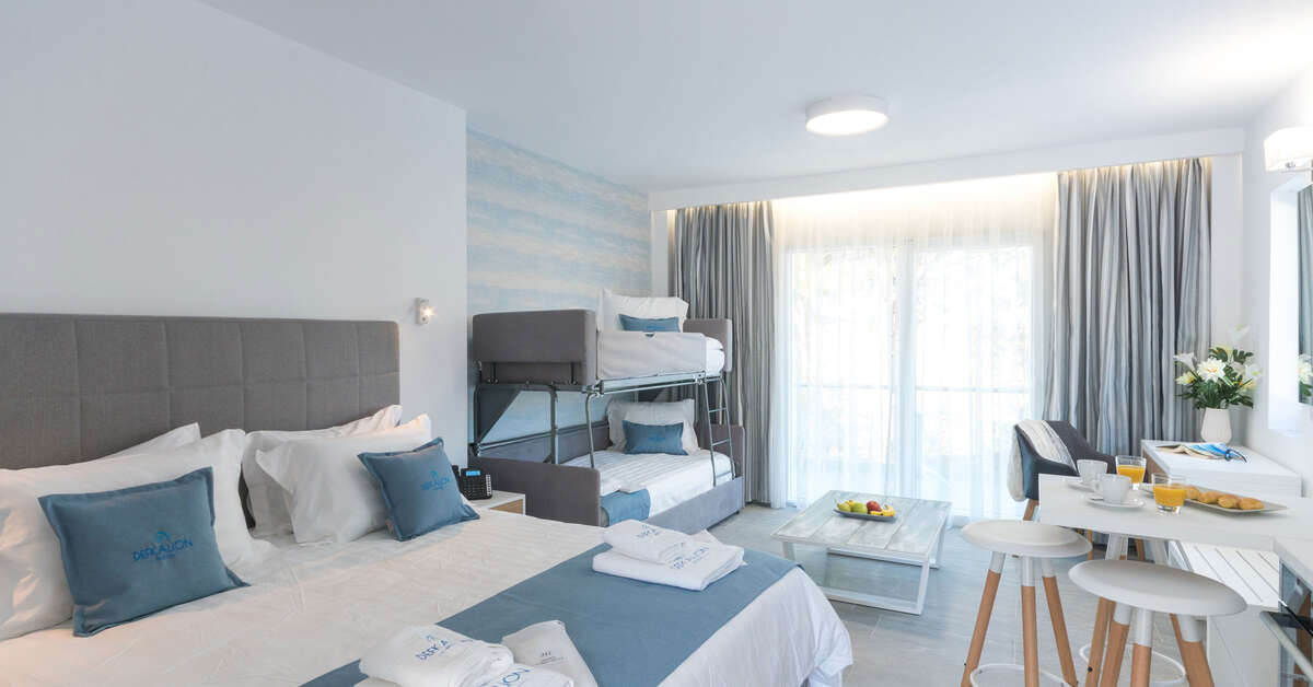 Family Suite with double bed, bunk beds and dining area